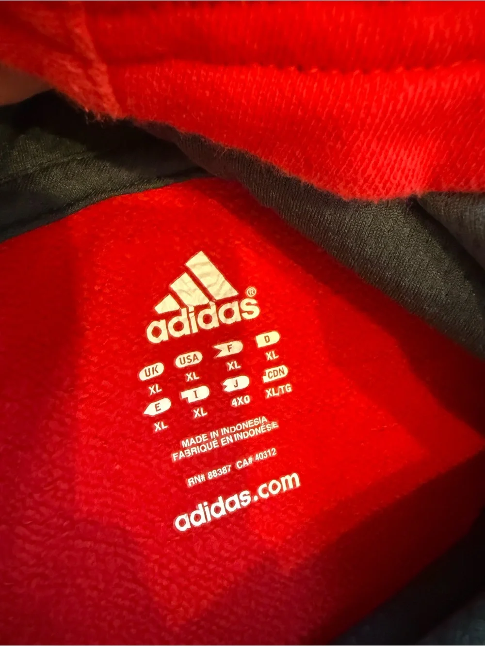 adidas Red Men’s Hooded Sweatshirt with Black Stripe Accents